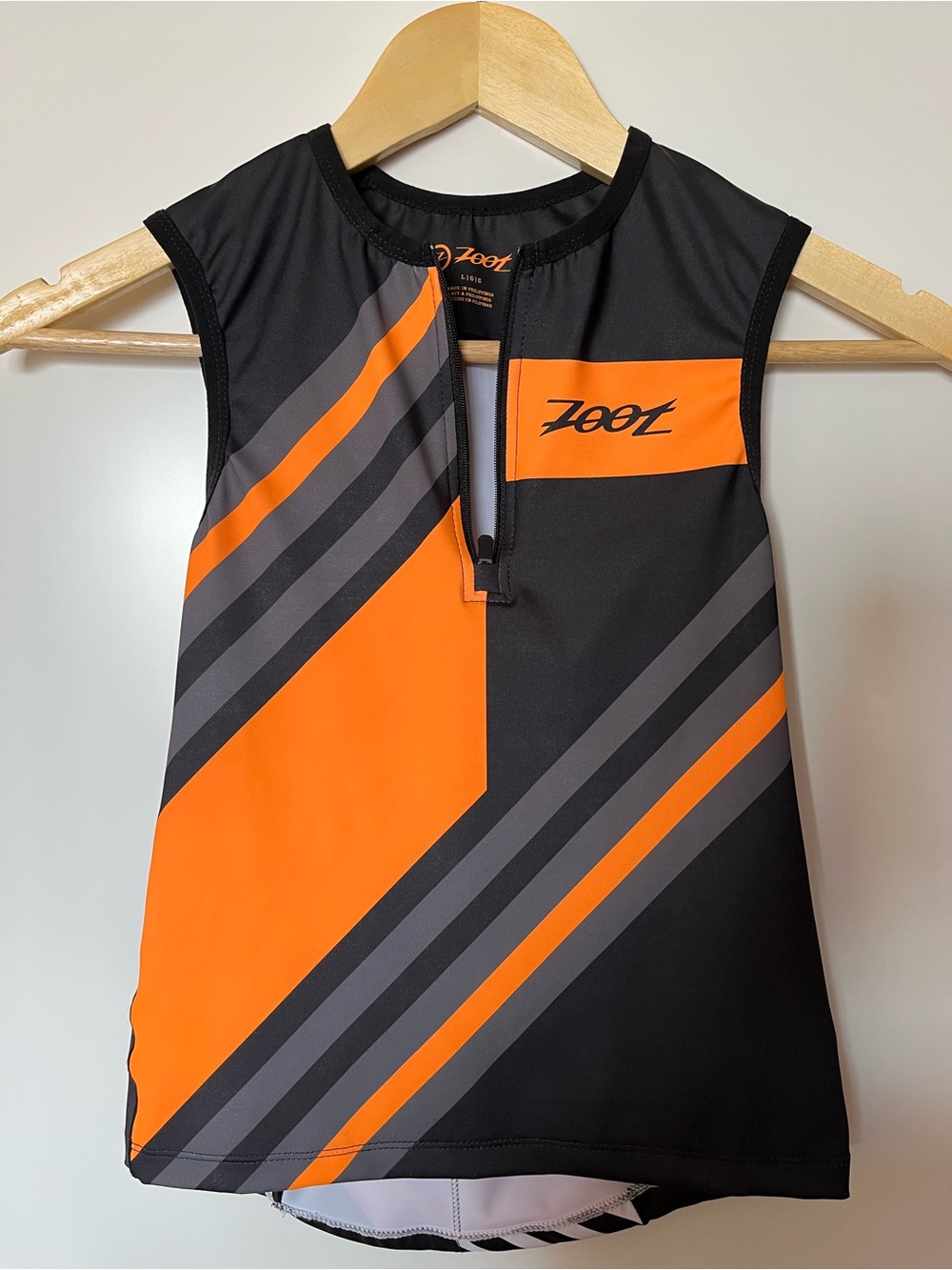 Zoot Kids Large Sleeveless Triathlon Performance Top Black Orange Zip